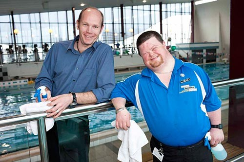 Long-serving employee Richard Bruce (right) with the manager at Freyberg Pool