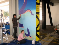 Art students creating public artwork in the Alfred Street car parking building.