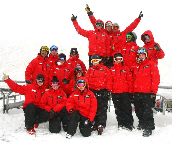 Michel Marchand (middle row, left) NZSki Snowsports School Director with rookie snow instructors on the deck at The Remarkables