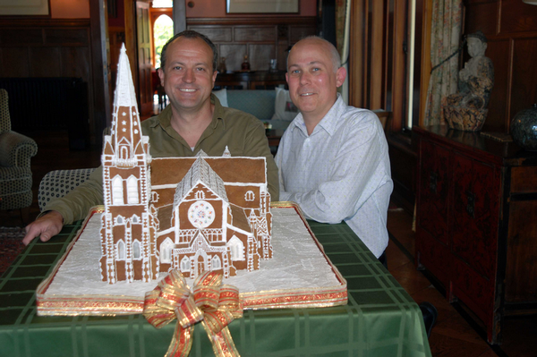 Pen-y-bryn Lodge owners James Boussy (L) and James Glucksman (R) with their magnificent Gingerbread House creation.