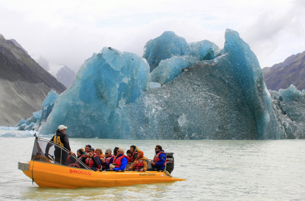  In perspective &#8211; a Glacier Explorers boat near the calving site.