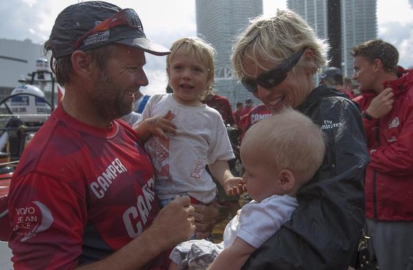 CAMPER skipper Chris Nicholson is reuntied with his family.