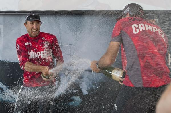 The CAMPER crew enjoy their champagne moment.
