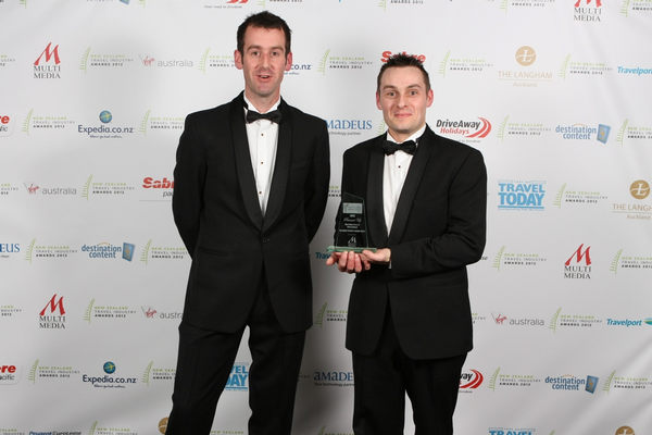 Matt Diack and Paul Cook receiving their NZ Travel Industry award at the Langham Hotel in Auckland last Saturday.