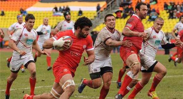 Viktor Kolelishvili scored one of Georgia's tries as they beat Russia to move top of the Division 1A standings. 