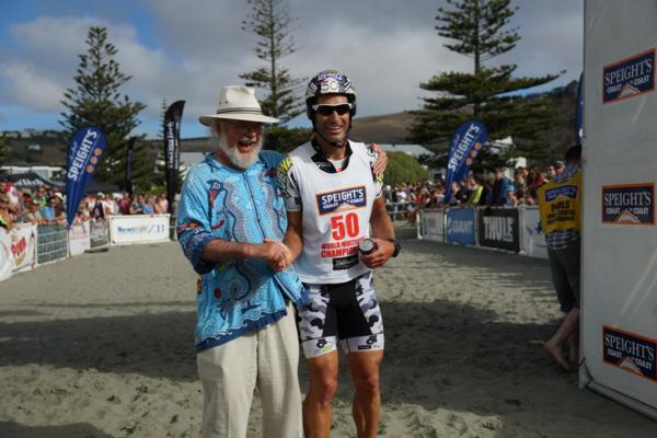 2) A changing of the guards - previous Race Director Robin Judkins greets the man now in charge of Speight's Coast to Coast, five time longest day winner Richard Ussher at the finish line of this year's event.
