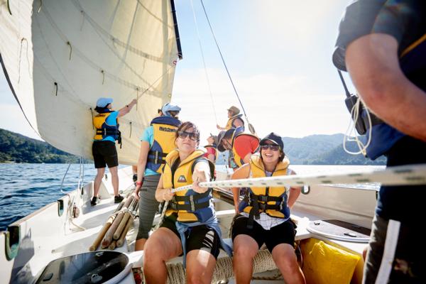 participants in an Outward Bound course enjoy sailing in the Marlborough Sounds. 