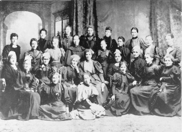 First meeting of the National Council of Women in ChCh in 1896. Kate Sheppard is 5th from the left, seated.