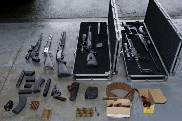 Firearms and ammunition were seized from addresses searched simultaneously in Auckland this morning
