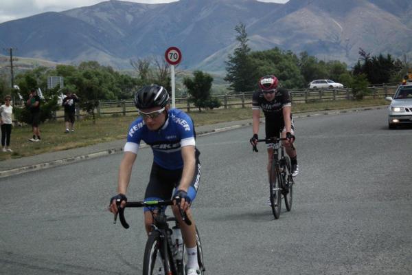 A satisfied Tim Rush rolls across the line ahead of Kees Duyvestyn to win the inaugural That Dam 108 kilometre Powerhouse road race