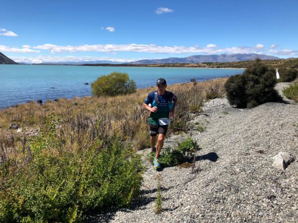 Australian James Kohler nears the finish line at Lake Middleton on the shores of Lake Ohau on the second day of the Back Country Cuisine Alps2Ocean Ultra