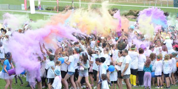 Crowds gather for the colour explosion at Colour Dash NZ