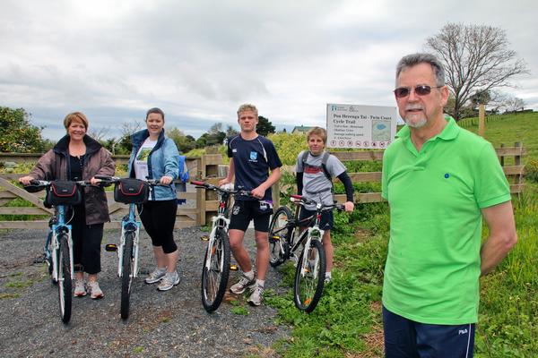 Retired Kaikohe bookseller Ray Clarke launched a cycle trail bike hire business on Monday with help from Paihia i-SITE staff, Julia Crane and Holly Adams, and Kerikeri High School students Tom Morrison and Bryn Lavell.