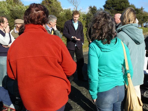 Green Party Co-Leader Russel Norman (centre) meeting local residetns at the Kaukapakapa site last week.