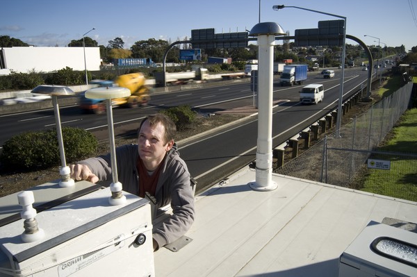 NIWA air quality scientist, Dr Ian Longley with an air quality monitoring station