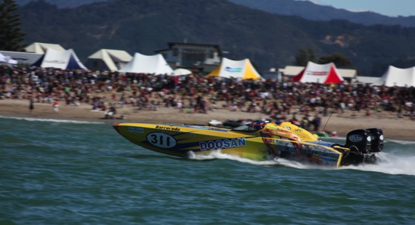 The Offshore powerboats raced along the beach as the crowds watched.