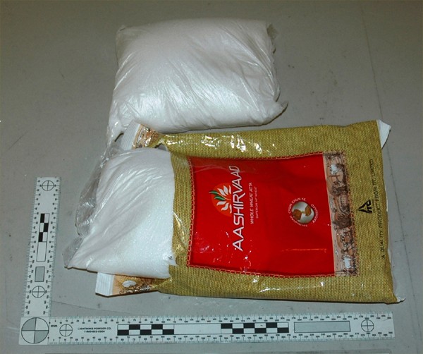 Two plastic bags of ephedrine concealed within food packaging