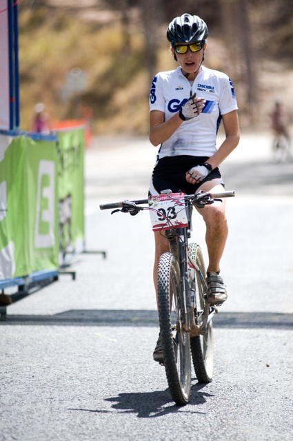 Adventurer Liesbeth Hessens crossing the third stage finish line victorious in the Australian Outback.