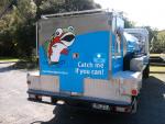 The Live Trout Truck with a message for motorists travelling behind it.