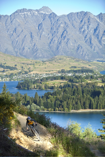 A rider enjoying the mountain bike trails accessed via Skyline Queenstown's new gondola-assisted lift service.