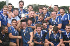 The champion University U21 rugby team celebrate.
