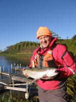 Shamus Brickland from Whangarei  with a nice 2.05 kg trout he caught from his kayak fishing on Lake Taharoa.