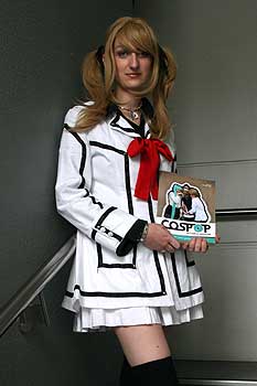 Kristen Den Otter dressed as 'Rima' from her  favourite Japanese graphic novel series  Vampire Night and holding her magazine CosPop