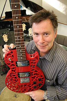 Professor Olaf Diegel with one of his 3D printed guitars.