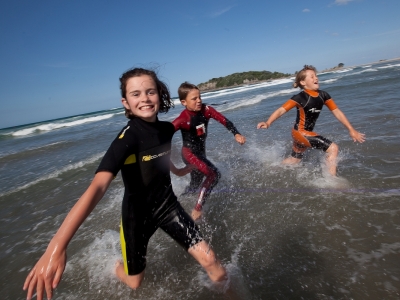 Fun in the water at Mt Maunganui Beach (L - R) Lily Roper (9), Jack Ryan (11) and Sophie Lawrence (9).