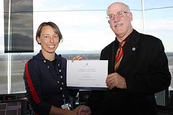 Dean's List recipient Sarah Ross receives her award from Pro Vice-Chancellor  Professor Lawrence Rose