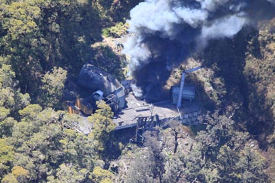 smoke billowing from the vent shaft vertical column after the fourth explosion on Sunday 28 November.