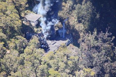 smoke billowing from the vent shaft vertical column after the fourth explosion on Sunday 28 November.