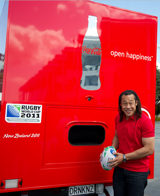 All Black legend, Tana Umaga stands by the COCA-COLA Happiness Truck