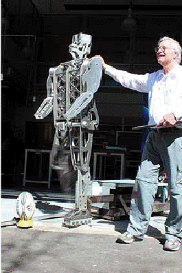 Dr Rory Flemmer with his goal-kicking robot. 