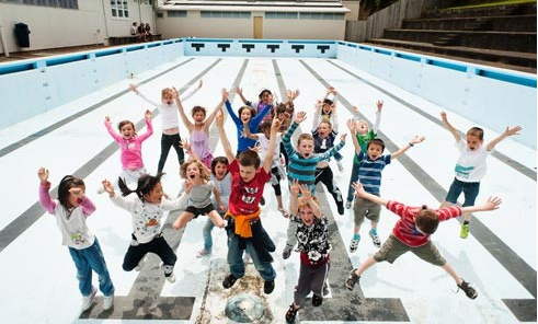 Clyde Quay schoolchildren jump for joy at the news of a new local pool.
