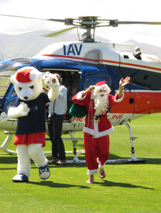 Santa and Paddles the Polar Bear gave a surprise helicopter visit to dozens of kids. 
