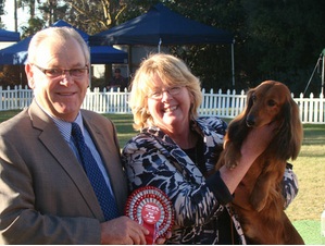 Marlborough Mayor Alistair Sowman and top dog Keaton Kosciosko with one of its owners, Beth Warman.