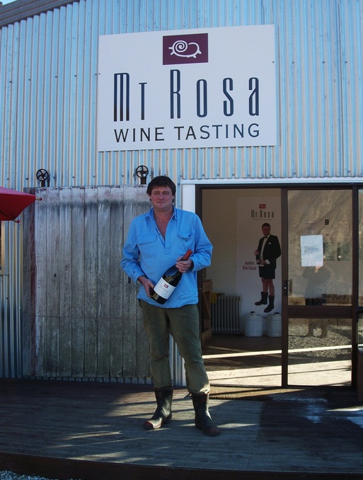 Jeremy Railton outside the Mt Rosa tasting room with a jeroboam of 2008 Mt Rosa Pinot Noir.