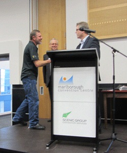 John Laing accepts the Best Community Initiative Award on behalf of the Marlborough Motorcycle Safety Group, a cross-community group that works to raise bike riders' safety record in this district. The award was won jointly with Clued Up Kids.