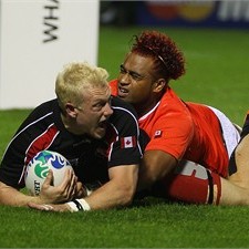 Phil Mackenzie scores the crucial try to put Canada ahead against Tonga