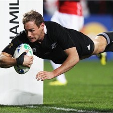 Andy Ellis flies over for one of the All Blacks' 13 tries against Japan