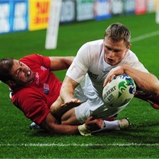 Chris Ashton slides in for his second - and England's sixth - try