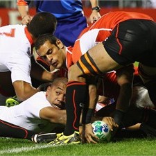 Viliami Ma'afu's try opens the scoring for Tonga against Japan 