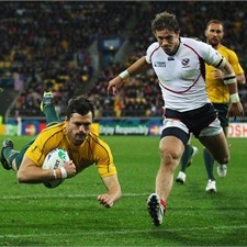 Adam Ashley-Cooper takes to the air when scoring against USA