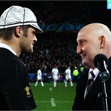 Richie McCaw receives his 100th Test cap from ex-All Blacks captain Jock Hobbs