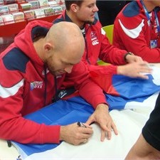 Russia's Igor Klyuchnikov signs autographs for fans at Rotorua Library