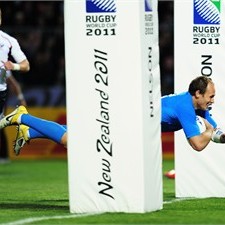 Skipper Sergio Parisse dives over to give Italy the perfect start