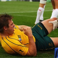 Australia wing Drew Mitchell gets treatment on his hamstring injury