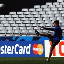 France coach Marc Li&#232;vremont gives a kicking demonstration during training