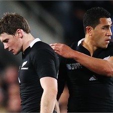 Mils Muliaina (R) consoles Colin Slade as he exits the Argentina match